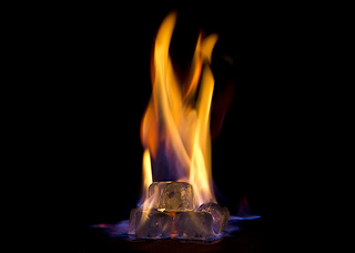 picture of a fire showing the common interpretation of the lukewarm idea in Rev 3:16