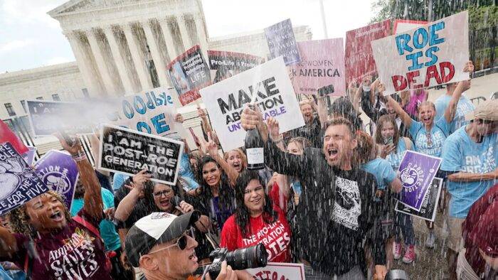 photo of celebration to mark the end of Roe v. Wade